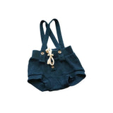 Jamie Kay Cotton Overalls hold