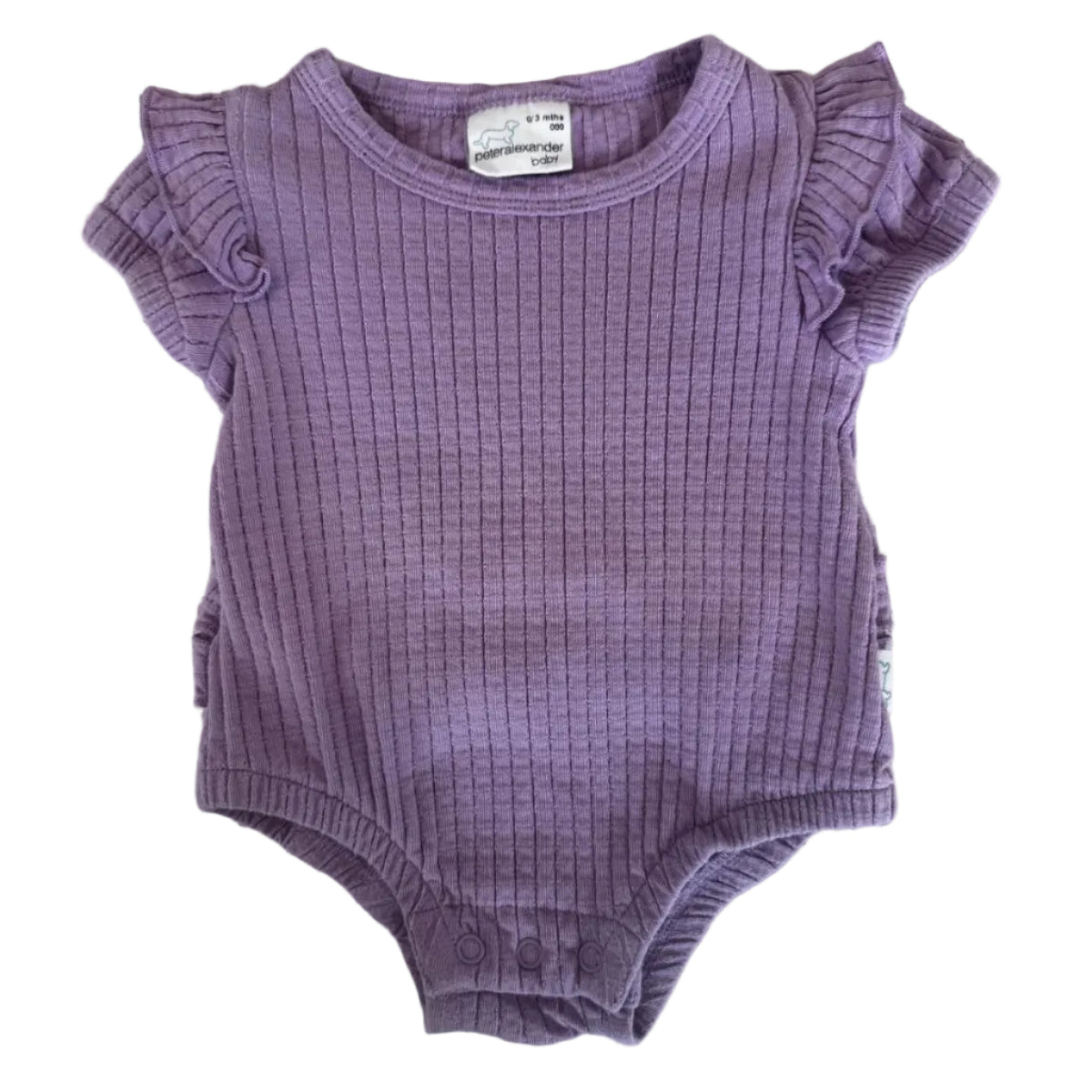 A baby's short-sleeve waffle-knit bodysuit in lavender purple, laid flat on a speckled stone countertop. The bodysuit features ruffled cap sleeves and a ribbed neckline.